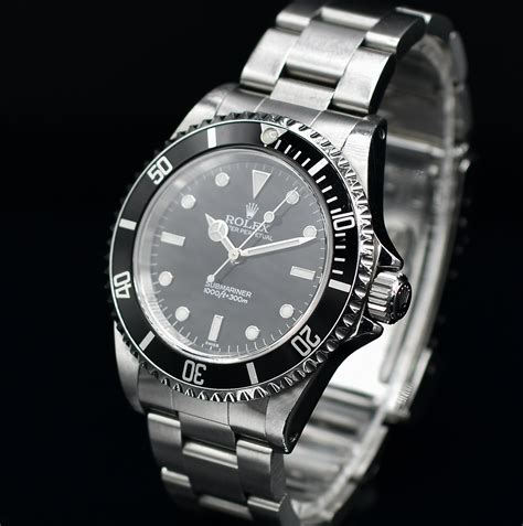 rolex submariner 14060m 2002|Rolex 14060 swiss only dial.